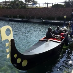gondola-in-loading-dock-point-waterfront-durban Two men on board a gondola at the Zulumoon loading=