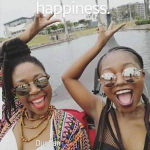Two happy students on a Zulumoon canal ride, highlighting the best boat rides Durban has to offer for a weekend escape.