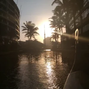 A beautiful sunset reflecting on the water, highlighting the best boat rides Durban has to offer for holidaymakers.