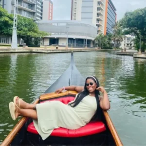A woman relaxing on a Zulumoon Gondola, showcasing why these are top choices for weekend boat rides in Durban.