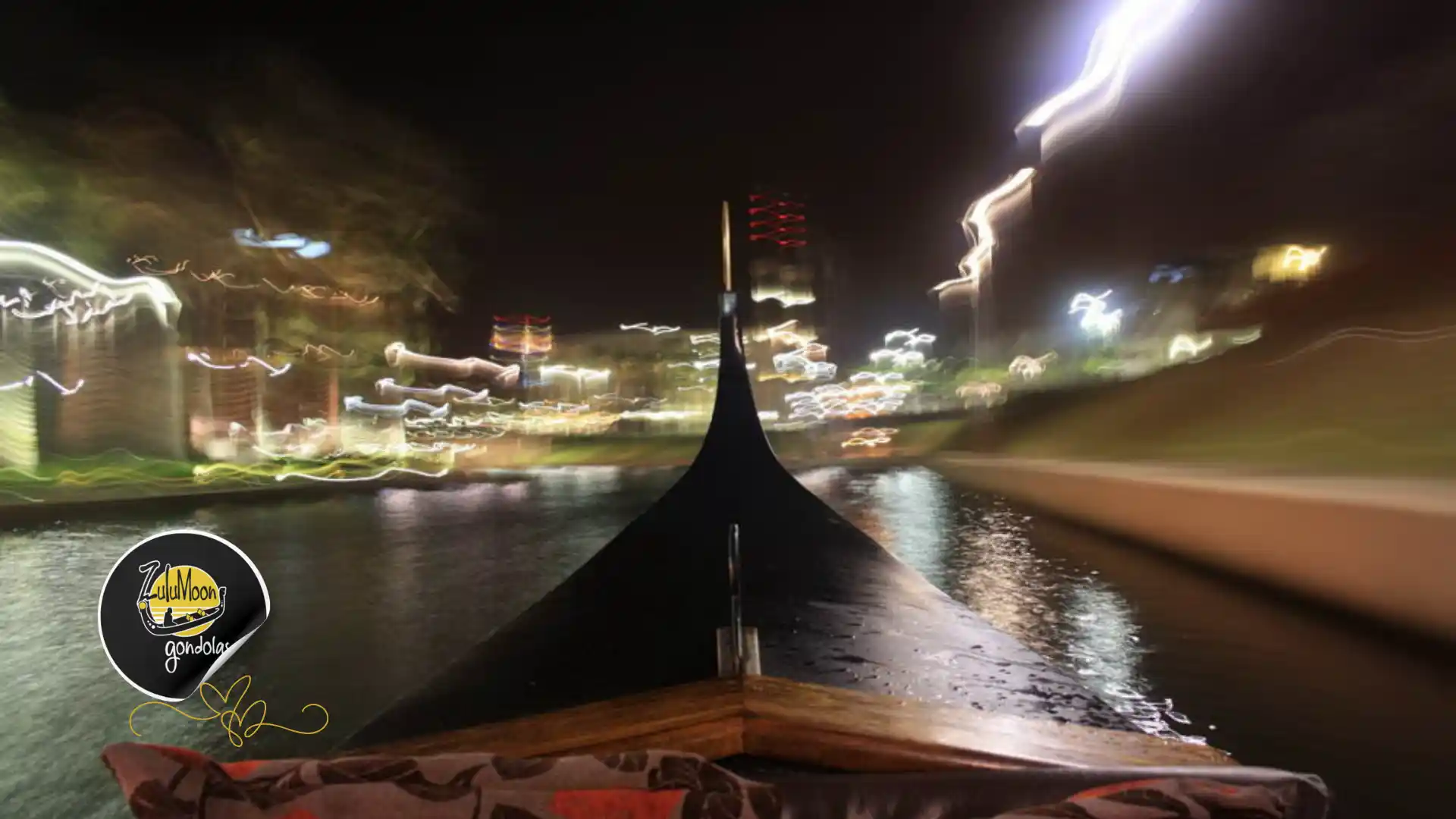 The front bow of a private gondola glides down the Point Waterfront canals during a magical Durban date night cruise.