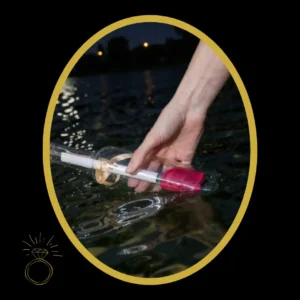 A lady lifts a message in a bottle from the canal during a romantic Durban gondola picnic proposal.